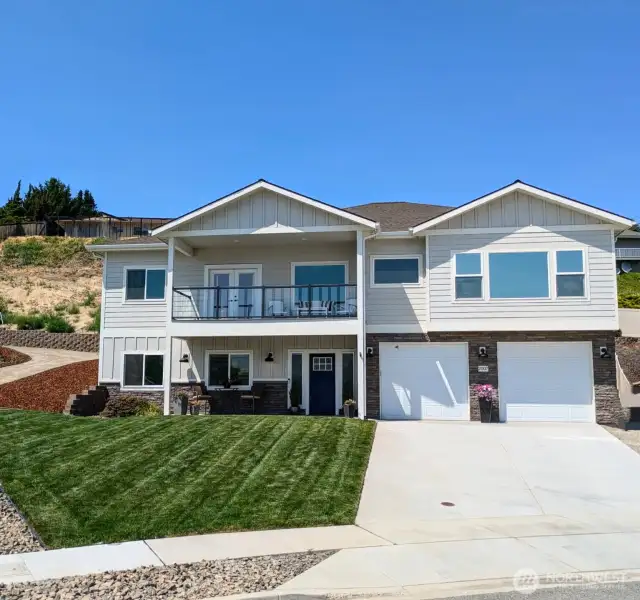 North end location with 4+ car garage.