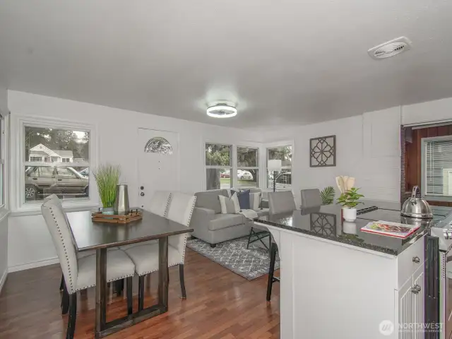 Very nicely updated interior with wood laminate floors, center island with granite counters and updated kitchen.  Home is bathed in natural light!