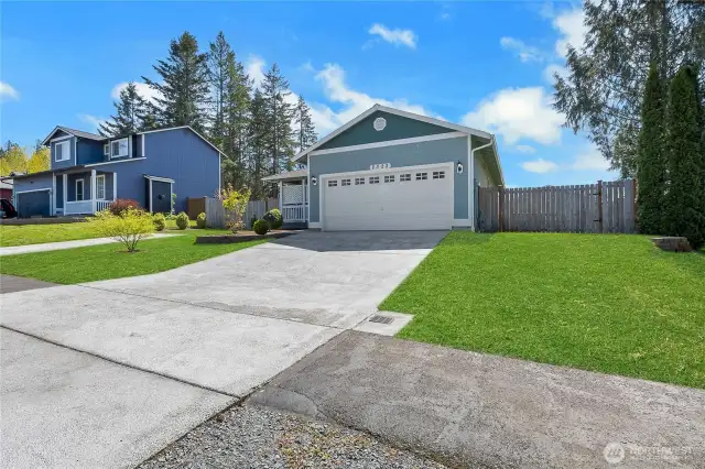 Large lot with ample room for parking, RV or Trailer parking and still room to play.