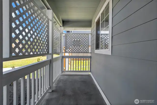 Front porch in covered and offers great privacy and security.