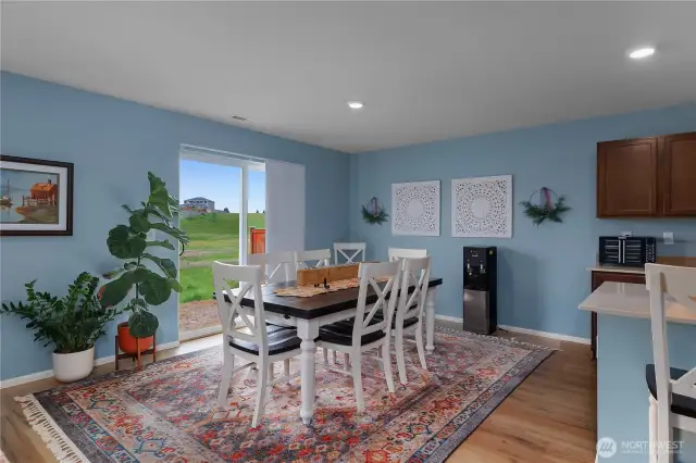 Large dining space with direct access to backyard overlooking The Preserve - note the privacy!