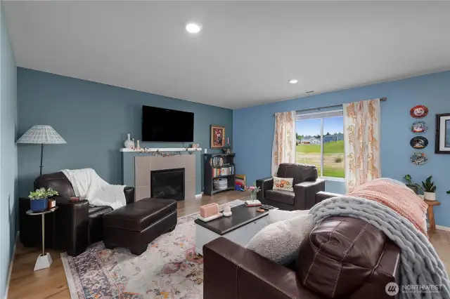 Great-sized living space open to kitchen with cozy gas fireplace!