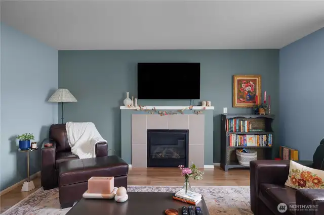 Great-sized living space open to kitchen with cozy gas fireplace!
