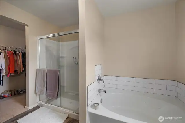 Primary en-suite with double sinks and plenty of space. Note the large walk in closet directly off the en suite.