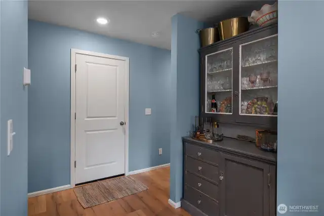 Garage door ahead, built in nook directly off kitchen.