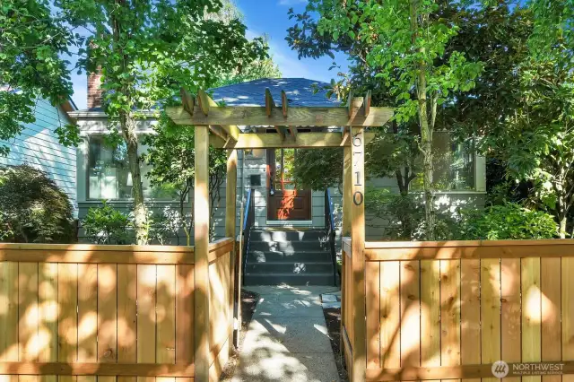 a lovely front arbor welcomes you to this gated and fully fenced front and back yard for maximum privacy and security for you and your pets!