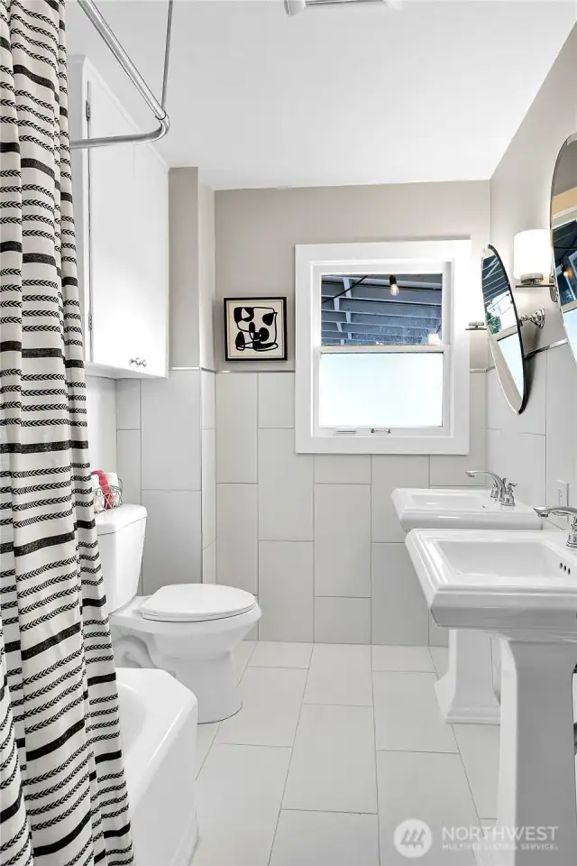 a fully redone bathroom completes the main level space
