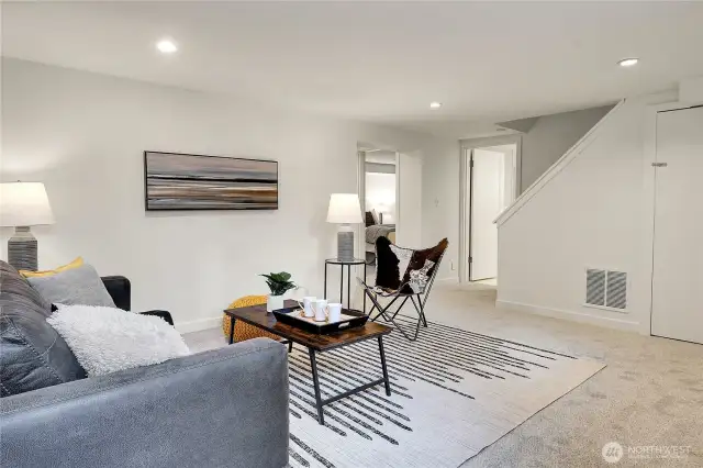 downstairs family room area has fresh carpet