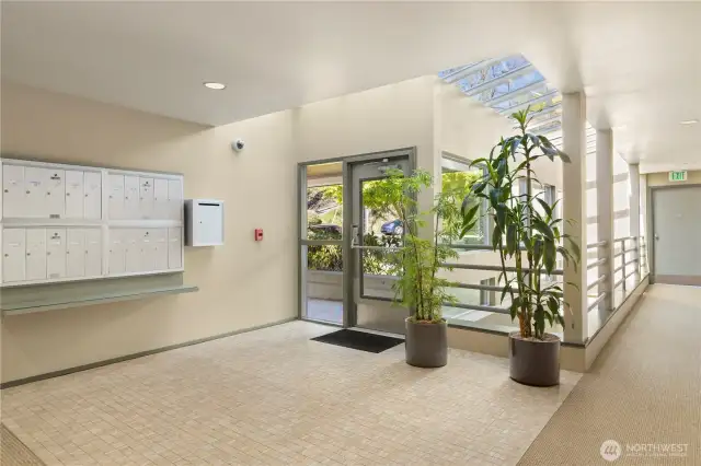 Nicely appointed entry. Lots of natural light, secure entry, convenient mailbox.