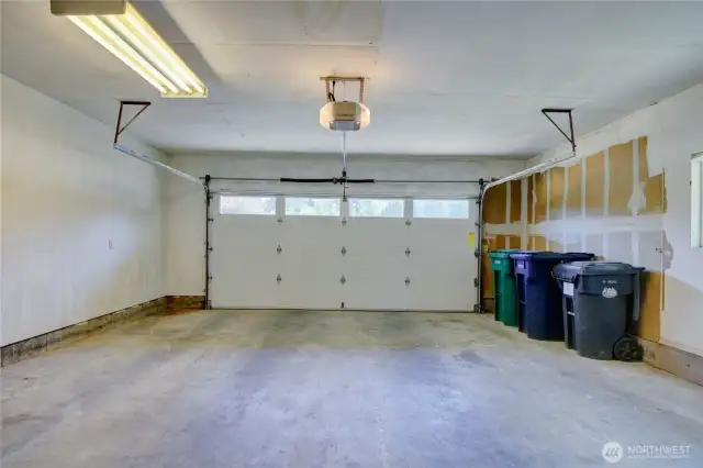 Spacious garage enters the home into the family room
