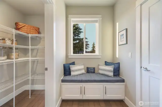 Large pantry and mudroom off back of kitchen with ease of grocery unloading right at garage door.