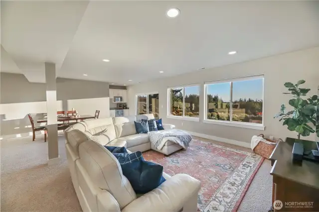 Walk down the stairs and be welcomed to the family room, perfect for movie nights.