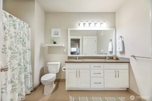 Jack and Jill bathroom attached to the primary and the family room.