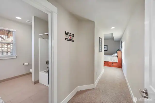 On the opposite side of the family room, you will find the entry to the 3rd primary suite.