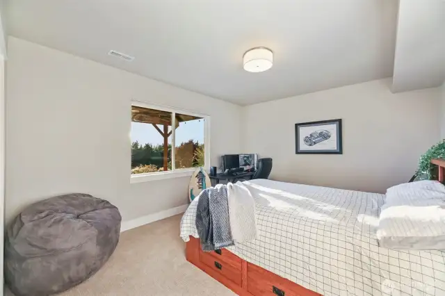 Western views peek out from the window in this large space with a walk-in closet to the left.