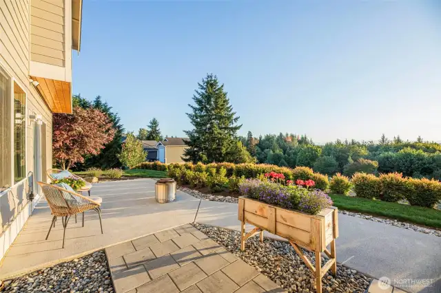 The oversized slider walks you out to the perfect patio for sunset bonfires.