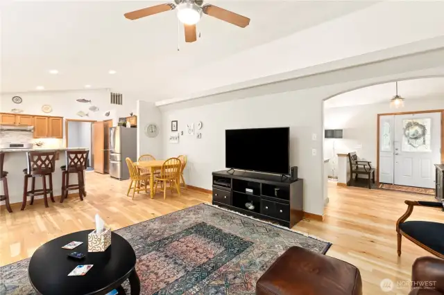 Family room open to Kitchen Living room on other side beautiful hardwood floors