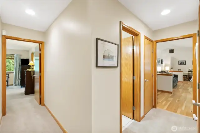 Looking towards primary bedroom and to right living room