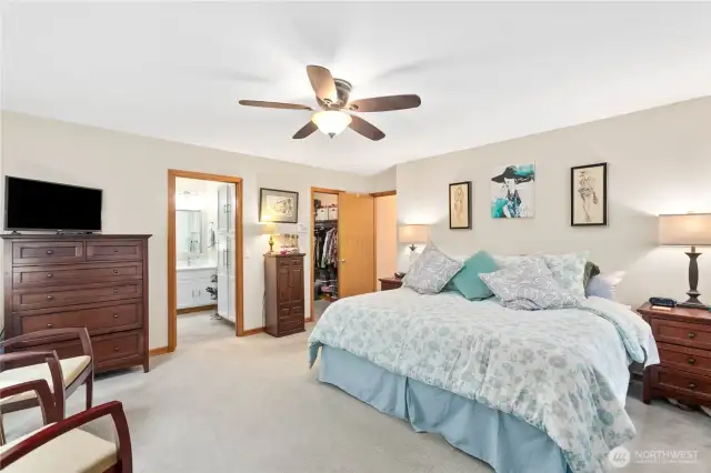 Primary Bedroom with tons of space, walk in closet and updated bathroom with heated floors