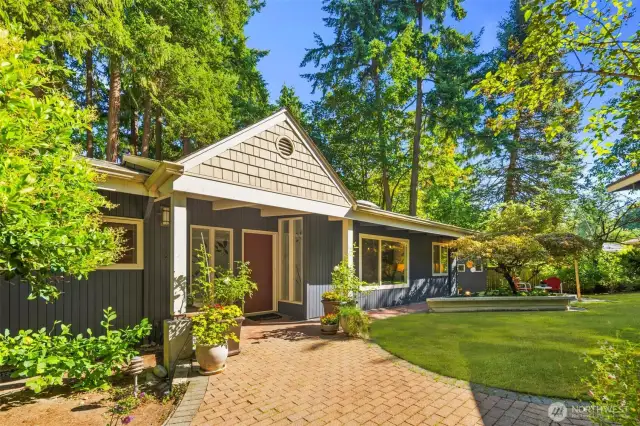 Fully fenced yard with garden beds