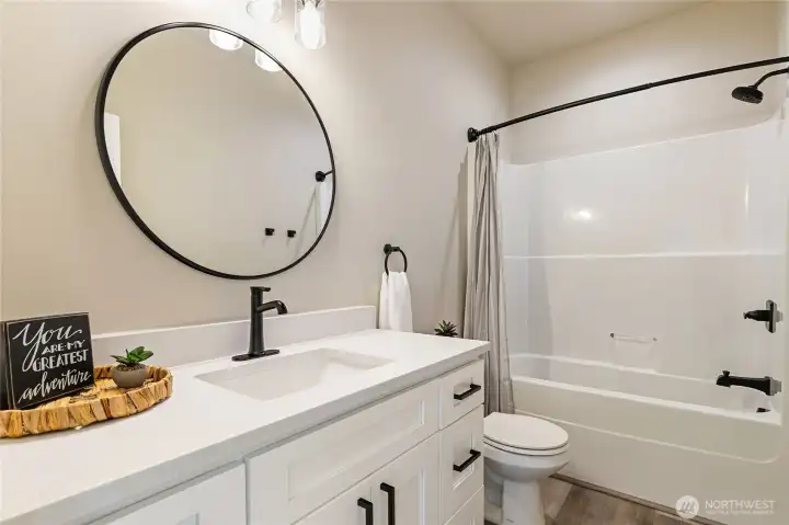 Full bathroom serves both the 2nd and 3rd bedroom