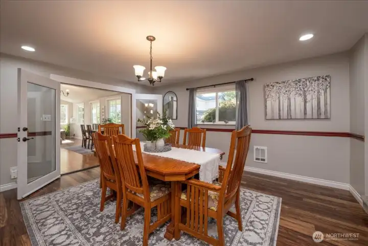 This stunning dinning room has room to seat 20 people if needed.  The dinning room opes to the sunroom.