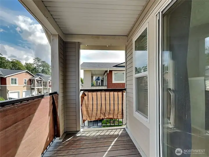 Back deck. Tarp up for privacy, can be removed
