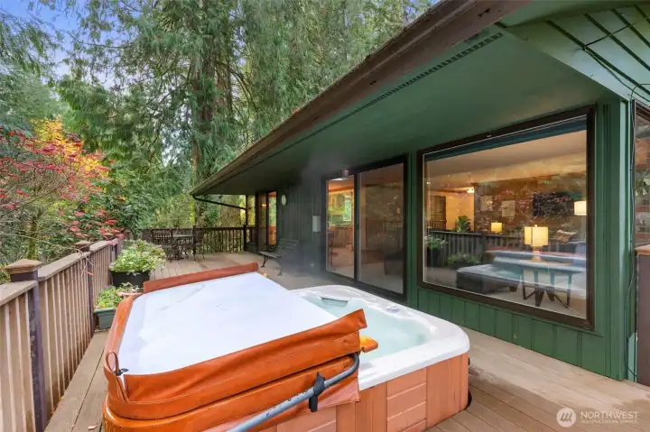 Relax in your bubbling hot tub and take in the private and serene views surrounded by nature.