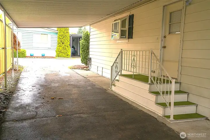 Covered carport and side door entrance