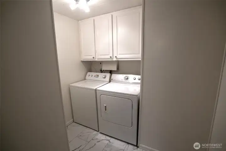 Laundry room with washer and dryer