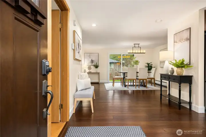 Engineered bamboo hardwood and cork flooring throughout.