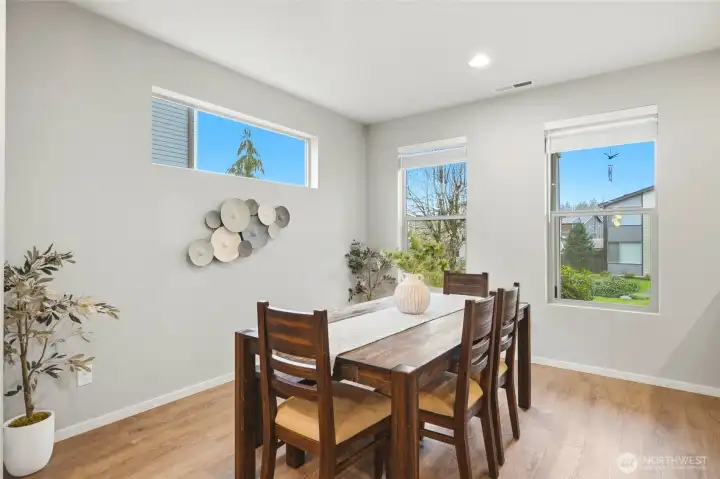 Formal dining space with clean finishes and open layout, ideal for hosting dinner parties or casual gatherings.