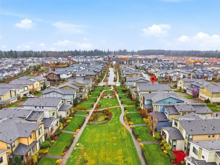 Final aerial showcasing the scale, design, and lifestyle of Ten Trails Black Diamond with trails, homes, and open spaces.