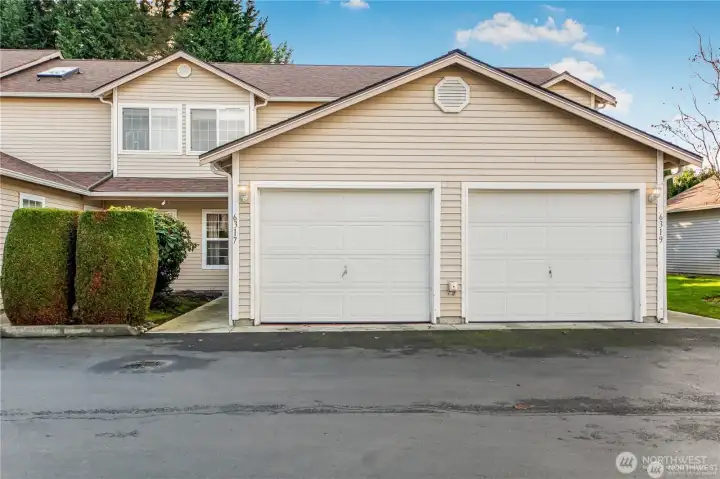 Attached garage and additional assigned parking spot located right out your front door.