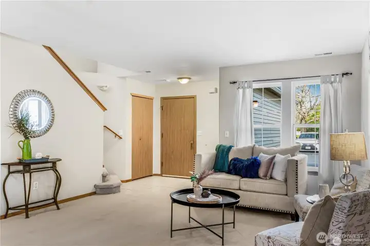 oking onto the open living area and staircase that takes you up to the bedrooms and laundry.