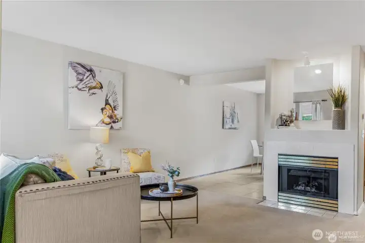 Relax and unwind in your open living area with gas fireplace.