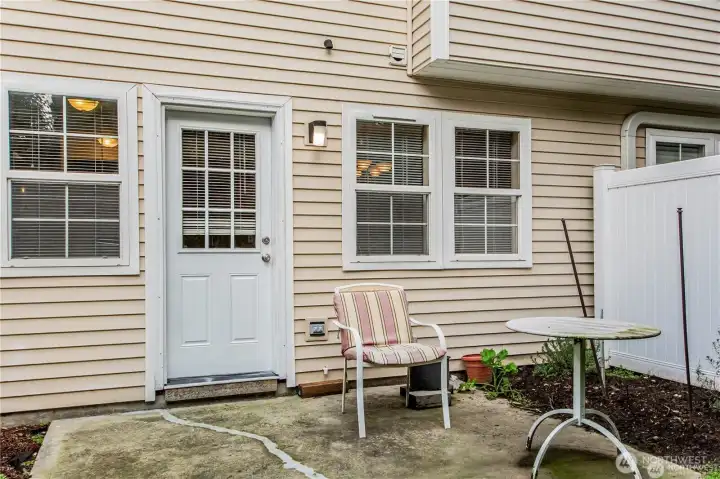 Backyard patio off of back door.