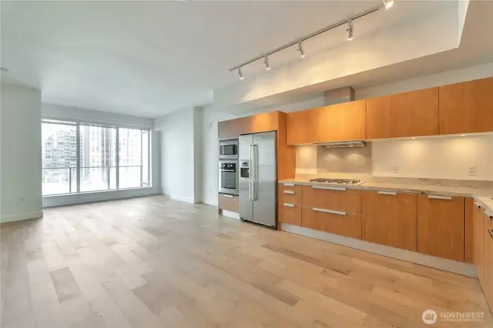 Kitchen and Living room with floor to ceiling windows