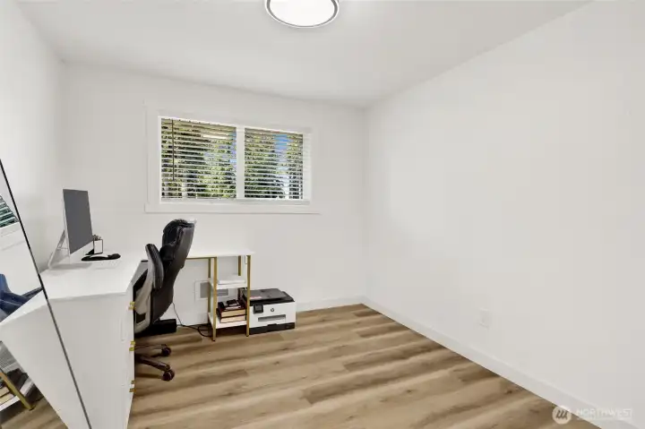 Bedroom #4 Comfortable space with natural light, ideal for guests, home office or hobby room!