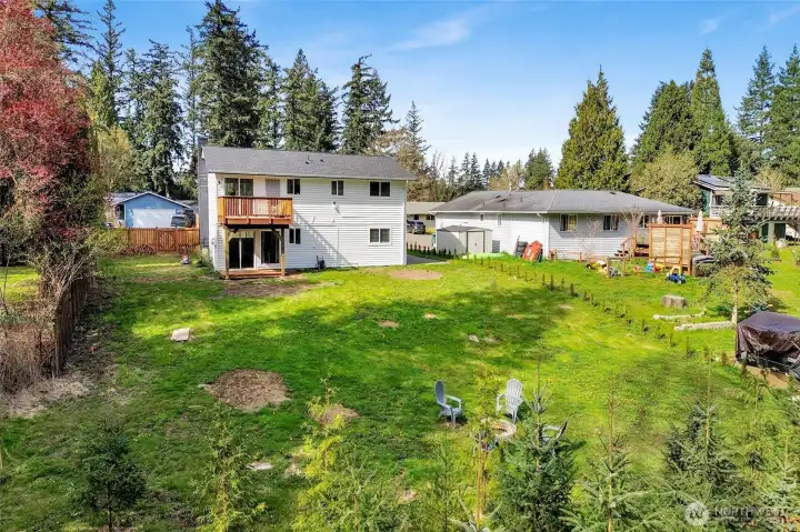 Spacious backyard with approved location for a future dwelling / guest suite, perfect for expansion or customization!