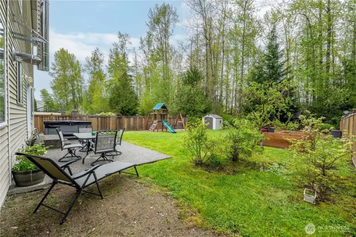 Beautiful Backyard with Raised Garden Beds