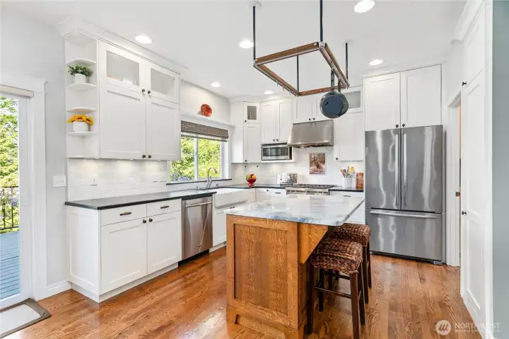 Beautiful kitchen with upgraded cabinets and appliances, and lake views Beautiful kitchen with upgraded cabinets and appliances, and lake views