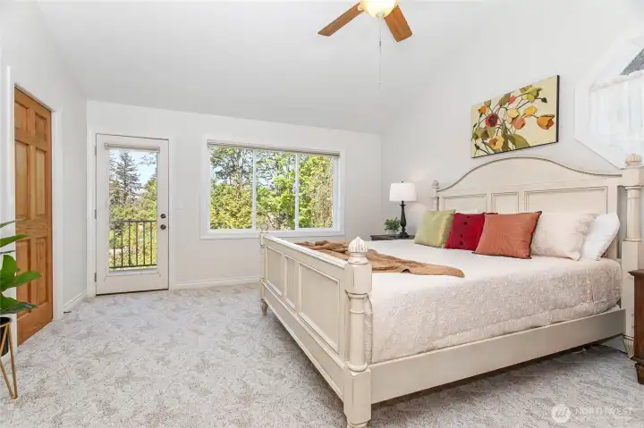 Huge primary bedroom with ensuite bathroom, walk-in closet and sundeck Huge primary bedroom with ensuite bathroom, walk-in closet and sundeck