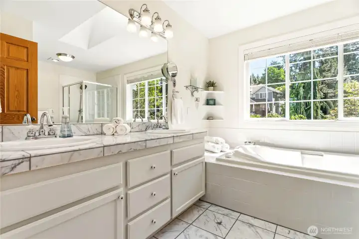 Light and bright primary bathroom with marble Light and bright primary bathroom with marble