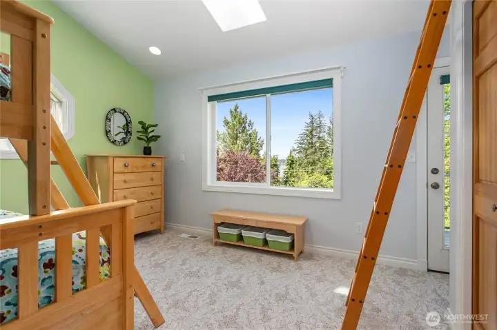Upstairs bedroom with lake views and hidden loft bed above the closet Upstairs bedroom with lake views and hidden loft bed above the closet