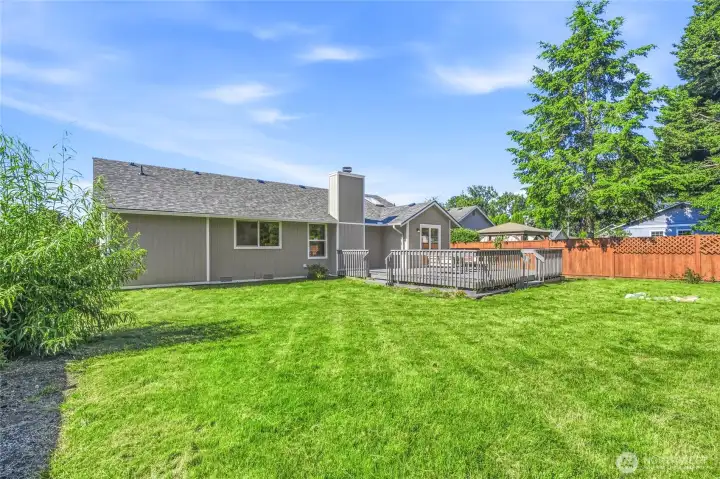 Fully Fenced Backyard Retreat  Enjoy your own private outdoor oasis featuring a fully fenced yard, perfect for pets, playtime, entertaining, and relaxing in comfort.