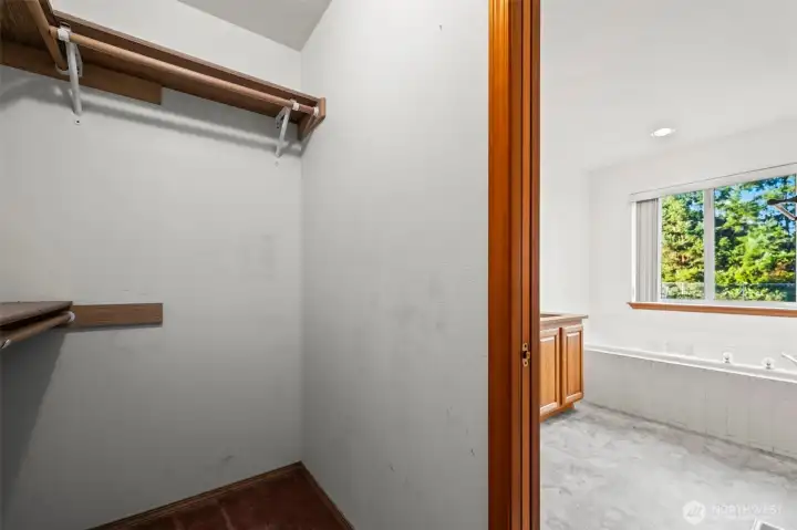 walk in closet and soaking tub in primary