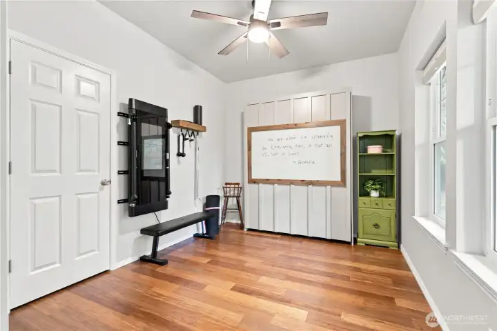 Main floor room for exercise, craft/ play or office....nice nautral light and access to the main living room Main floor room for exercise, craft/ play or office....nice nautral light and access to the main living room