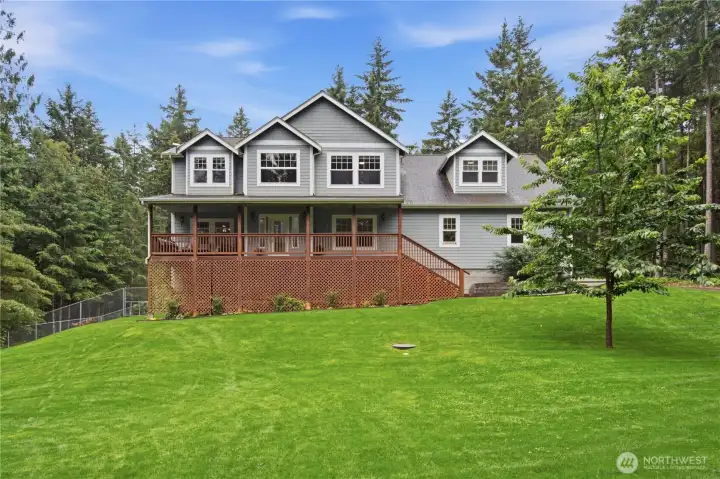 Front yard, lush lawn and room to run, firepit and trees with spots to relax! Front yard, lush lawn and room to run, firepit and trees with spots to relax!