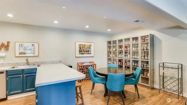 Enjoy this lower kitchen with breakfast bar seating and dining space as well. Entertainer's dream!